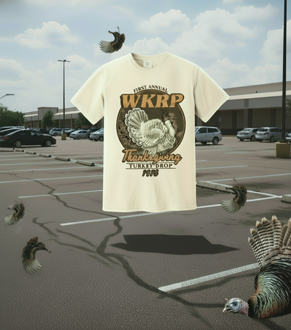 Beige t-shirt with a Thanksgiving graphic and text on a white background