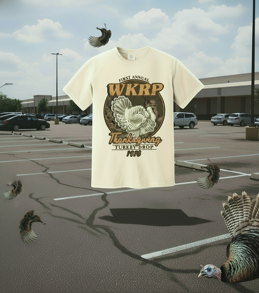 Beige t-shirt with a Thanksgiving graphic and text on a white background